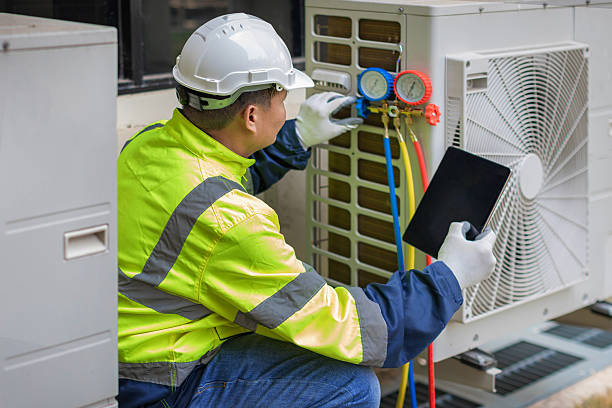 Professional Air Conditioning Repair technician working in New Middletown, OH